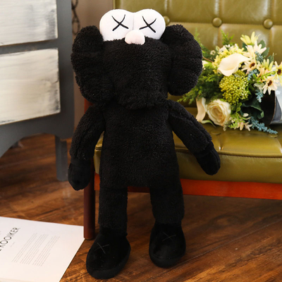 O luxuoso lavável de BFF Kaws brinca descansos como o presente de época natalícia