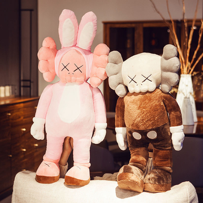 O luxuoso lavável de BFF Kaws brinca descansos como o presente de época natalícia