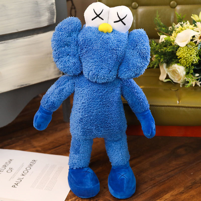 O luxuoso lavável de BFF Kaws brinca descansos como o presente de época natalícia